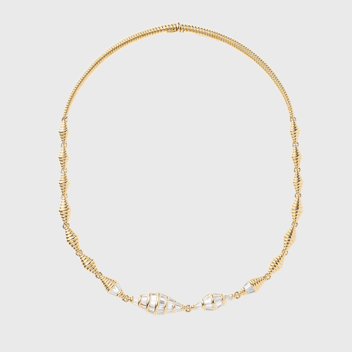 Yellow gold necklace with tapered baguette cut white diamonds