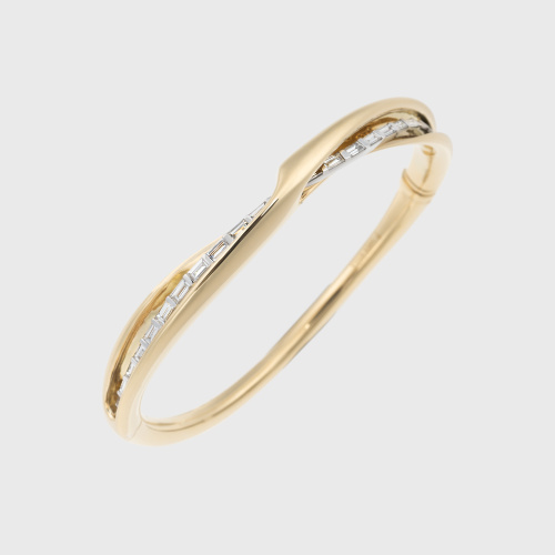 Yellow gold cuff bracelet with baguette cut white diamonds