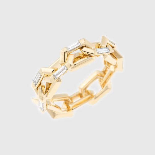 Yellow gold ring with baguette cut white diamonds